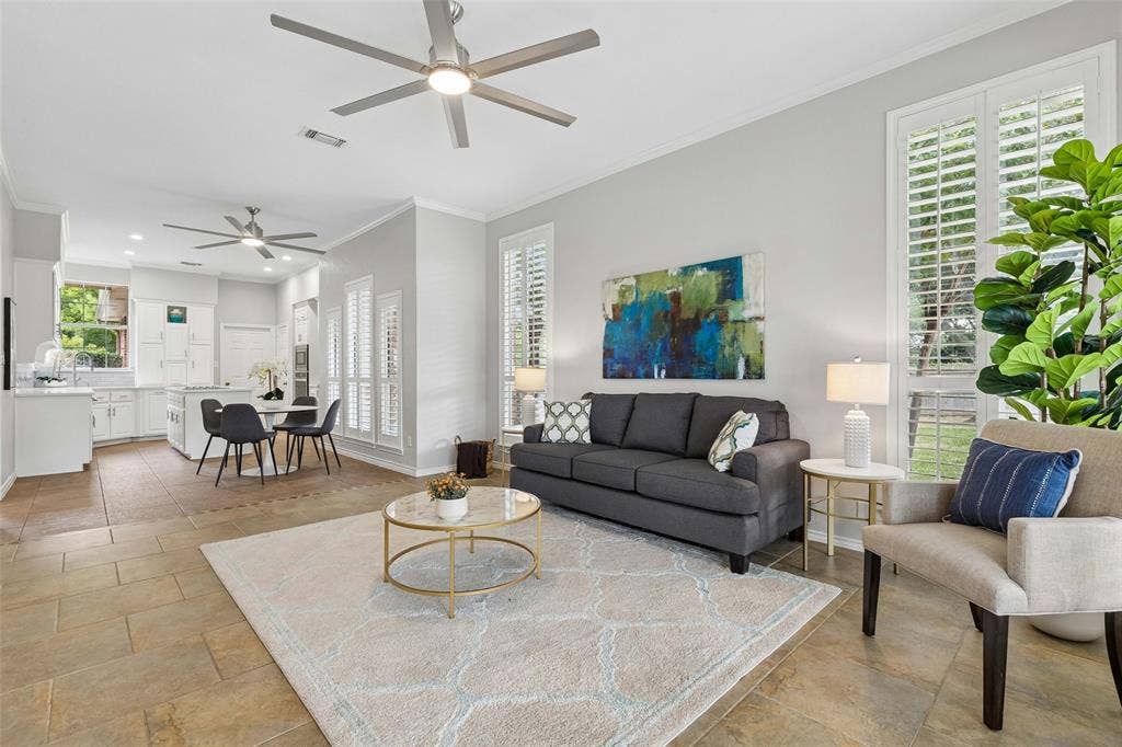 Den open to kitchen and breakfast area