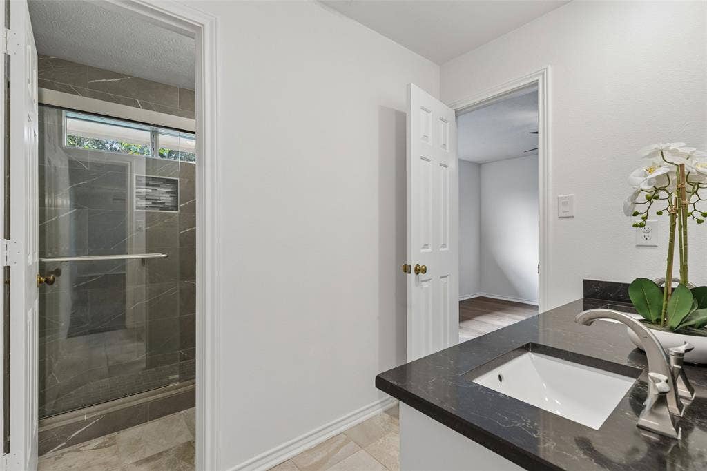Upstairs bathroom with separate shower/toiler area