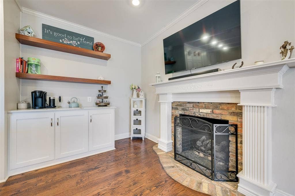 Coffee bar in kitchen with propane fireplace.