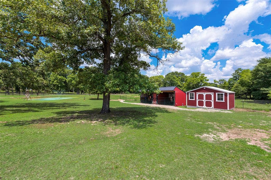 View of 2 stall loafing shed and 10x16 tack room or storage building