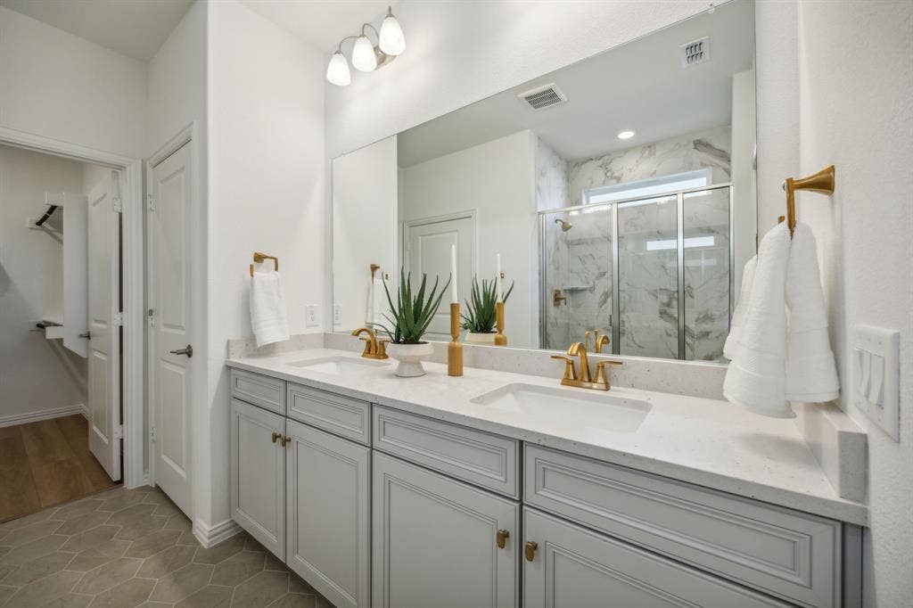 *Model Representation - Owner's private bath with double vanity