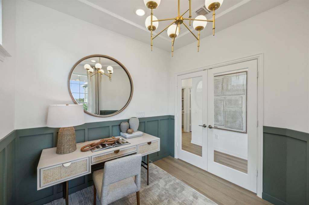 *Model Representation - Flexible living space off entryway, can be used as a study