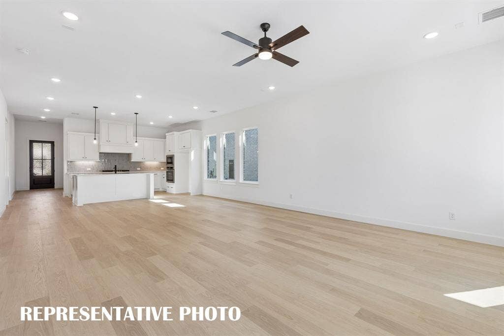 The open and flowing floor plan in our Chapelle II plan is an entertainer's dream home!  REPRESENTATIVE PHOTO