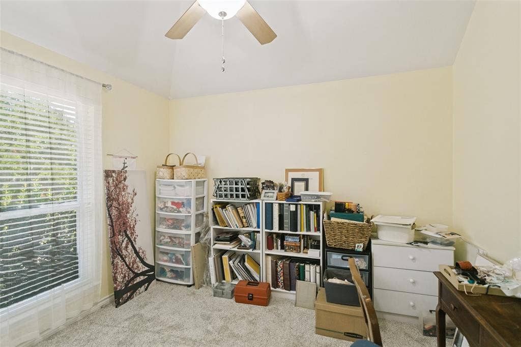 3212 Chippenham Drive, Plano, TX 75093 Vaulted ceiling featuring a central ceiling fan with integrated lighting and a large window with horizontal blinds