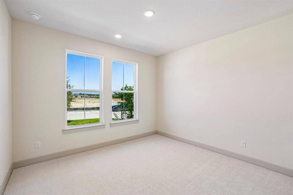 4733 Peary Lane, McKinney, TX 75071 You'll find nicely sized secondary bedrooms in our Tristan floor plan.