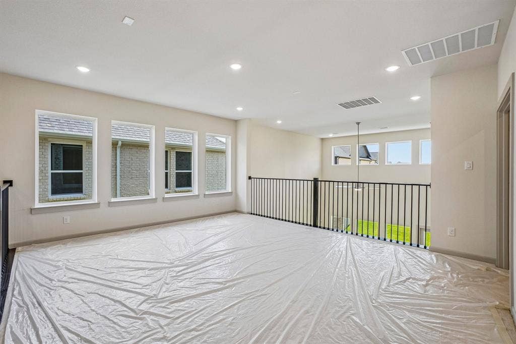 4733 Peary Lane, McKinney, TX 75071 Spacious and bright, this game room offers endless family fun time!