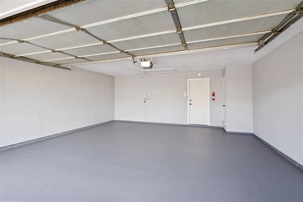 4063 Seabury Drive, Dallas, TX 75287 Brand new Epoxy painted floor & walls and insulated Garage door.