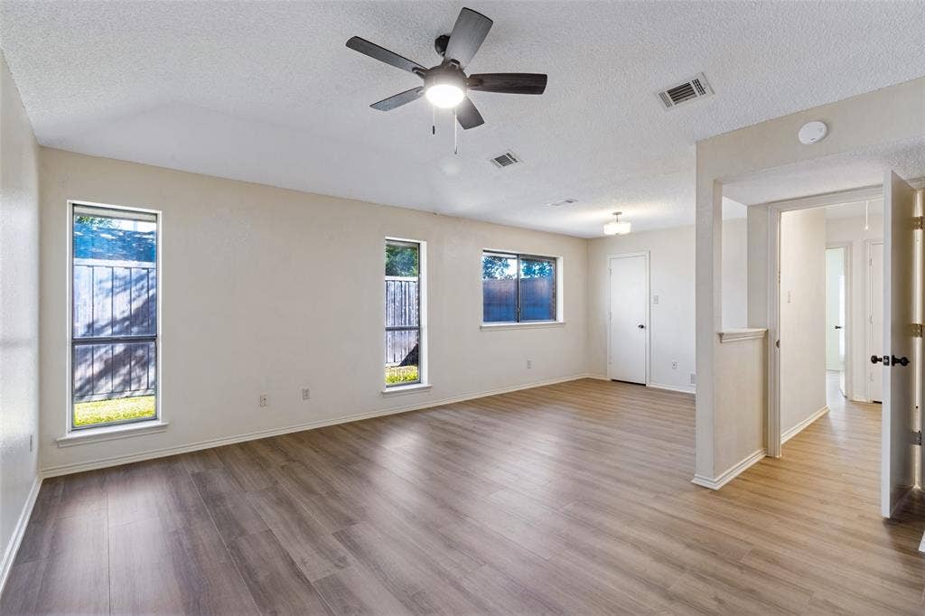 4063 Seabury Drive, Dallas, TX 75287 Primary bedroom also has direct access to the patio and backyard area.