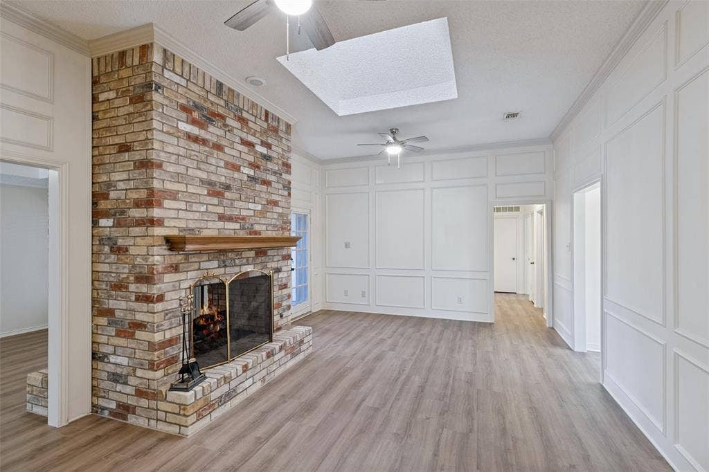 4063 Seabury Drive, Dallas, TX 75287 Natural light with a large skylight and direct access to the backyard patio.
