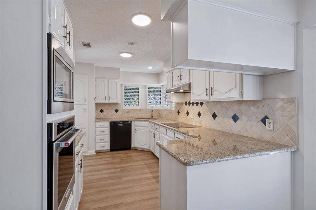 4063 Seabury Drive, Dallas, TX 75287 Direct access to the kitchen from the breakfast area.