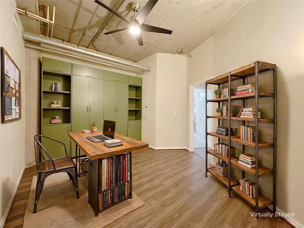 1001 Belleview Street, #307, Dallas, TX 75215 Secondary bedroom features built-in queen sizemurphy bed