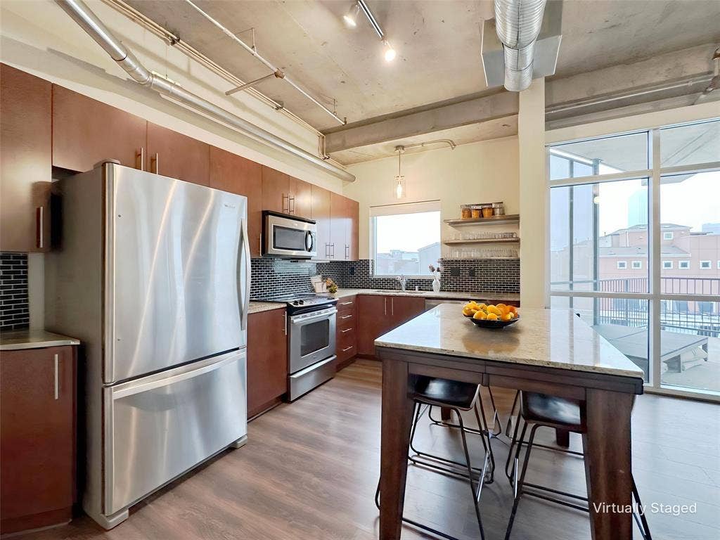 1001 Belleview Street, #307, Dallas, TX 75215 Stainless steel appliances, refrigerator, washer anddryer included