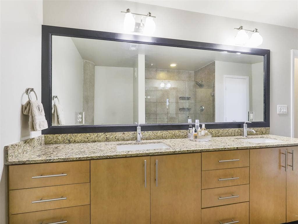 1001 Belleview Street, #307, Dallas, TX 75215 Oversize vanity with double sinks and plenty ofdrawer space