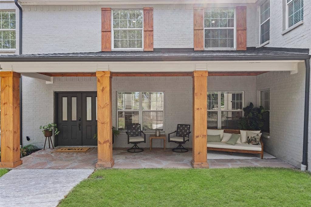 5860 Newt Patterson Road, Mansfield, TX 76063 Inviting cedar wrapped covered front porch perfect for a morning coffee.
