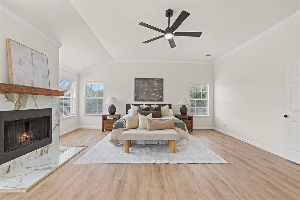 5860 Newt Patterson Road, Mansfield, TX 76063 Primary bedroom with wood burning fireplace
