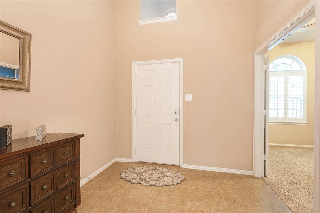 5320 Grovewood Drive, McKinney, TX 75071 Your view to front door and entry way