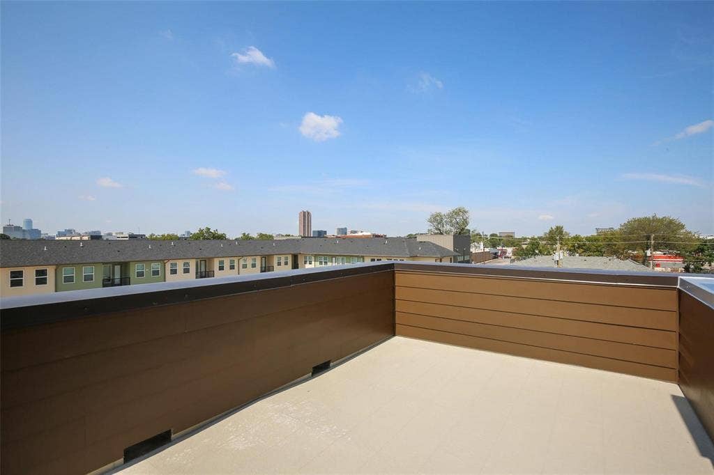 4904 Lexington Court, Dallas, TX 75206 Rooftop terrace featuring horizontal composite siding, concrete flooring, and metal cap flashing
