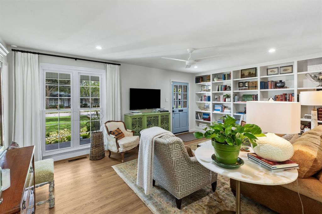 1105 N Waddill Street, McKinney, TX 75069 The home exudes an abundance of natural light. All windows have been updated!