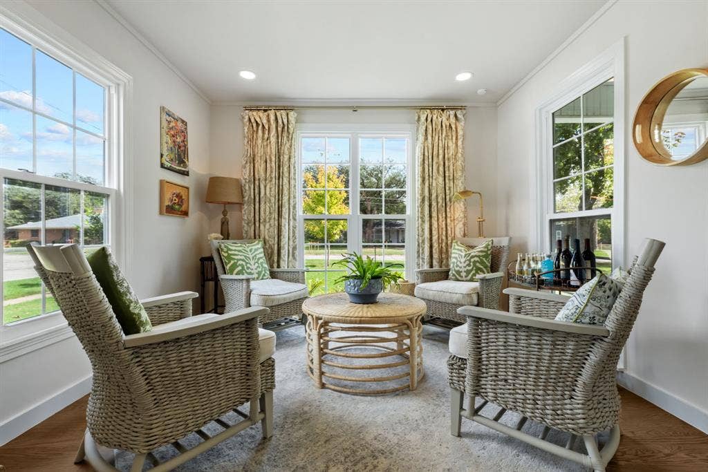 1105 N Waddill Street, McKinney, TX 75069 The charming Keeping Room, nestled alongside the beautifully renovated kitchen, offers a warm and inviting retreat for morning coffee, casual conversation, or simply relaxing in the heart of the home.