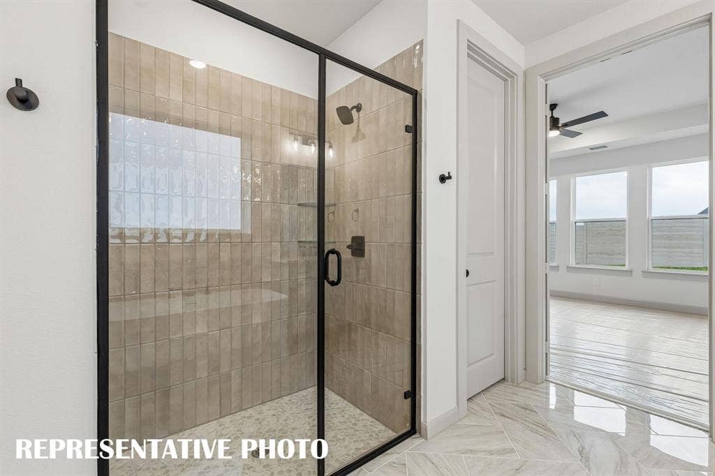 4520 Sunfish Lane, McKinney, TX 75071 Relax and enjoy a long luxurious shower in this spacious walk in shower! REPRESENTATIVE PHOTO