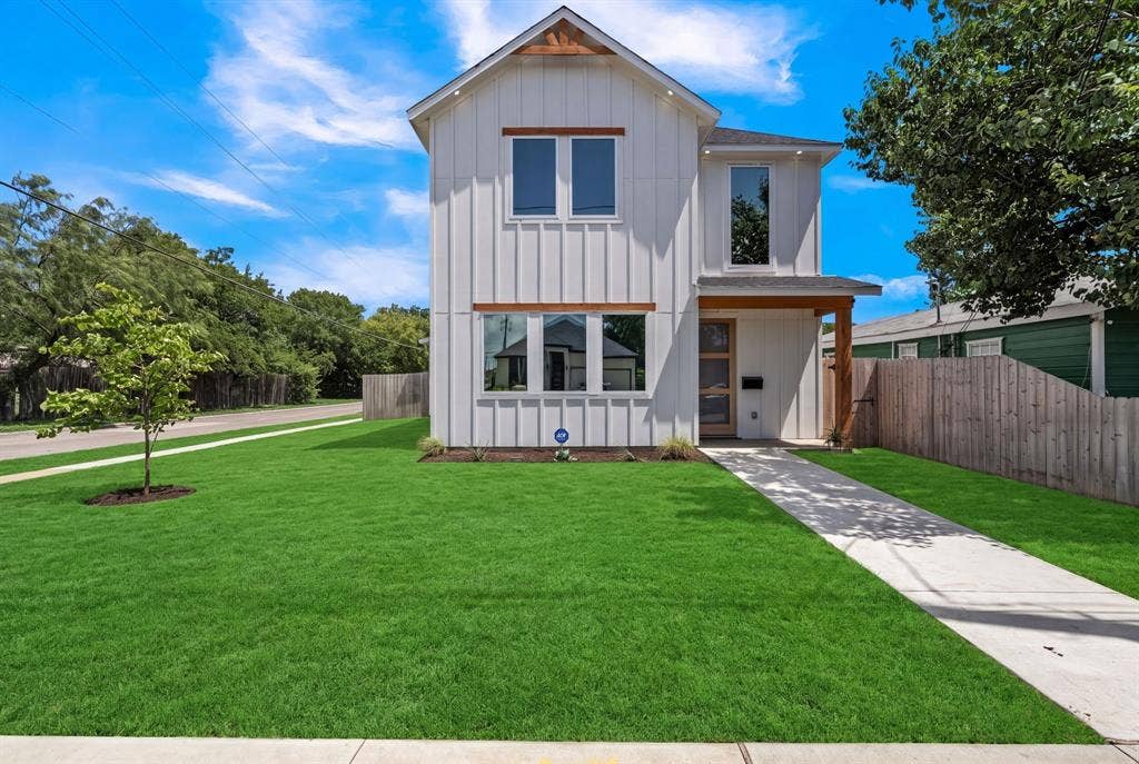 3639 Pueblo Street, Dallas, TX 75212 Modern board-and-batten exterior with timber accents, covered entry, and concrete walkway