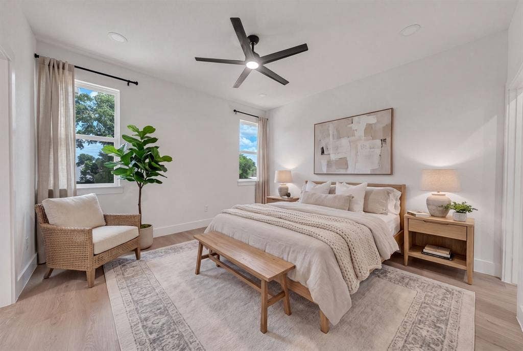 3639 Pueblo Street, Dallas, TX 75212 Room featuring wood-finish flooring, recessed lighting, matte black ceiling fan, and dual pane windows