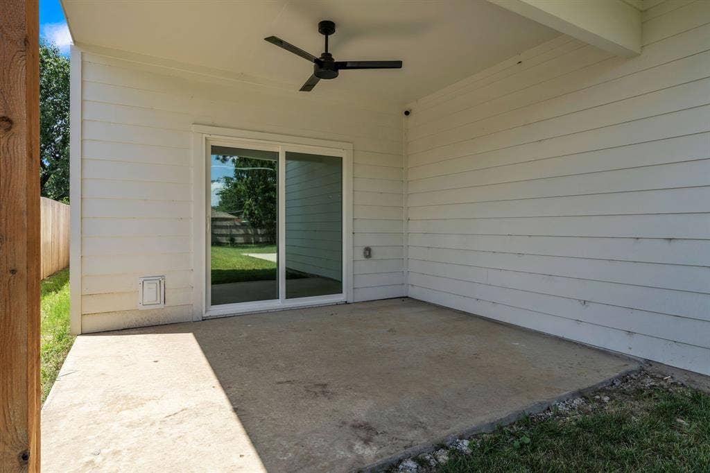 3639 Pueblo Street, Dallas, TX 75212 Covered patio featuring horizontal siding, a concrete floor, and a ceiling-mounted fan