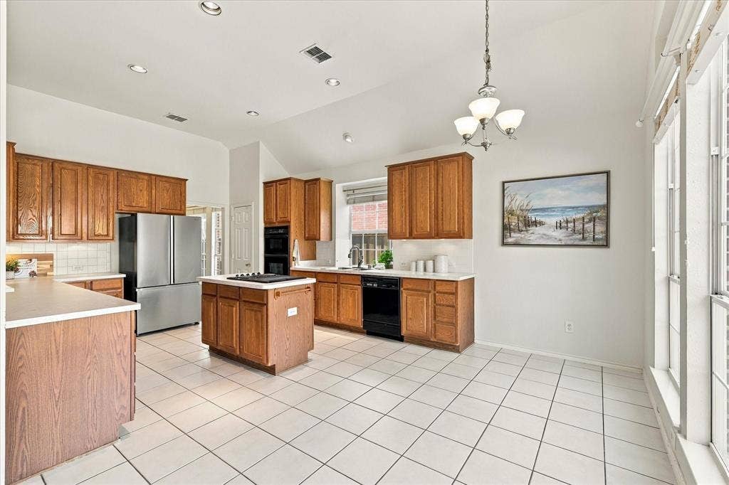Additional view of the kitchen.