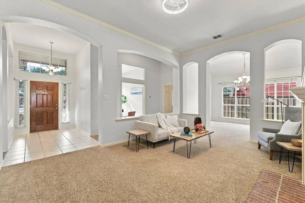 Overlooking entry way, living room, dining room, and office.