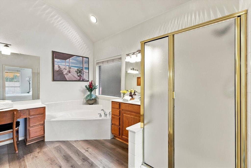 Spacious bathroom with garden tub awaits you.
