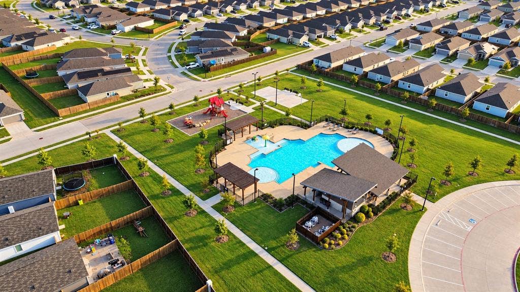 6742 Highlands Street, Princeton, TX 75407 Community recreational area featuring a swimming pool, covered pavilion with built-in outdoor kitchen, playground, and sports court