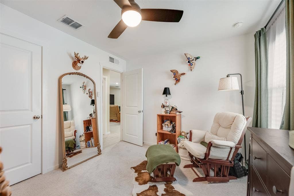 6742 Highlands Street, Princeton, TX 75407 Room featuring neutral carpeting, a ceiling fan with integrated lighting, and two-panel interior doors