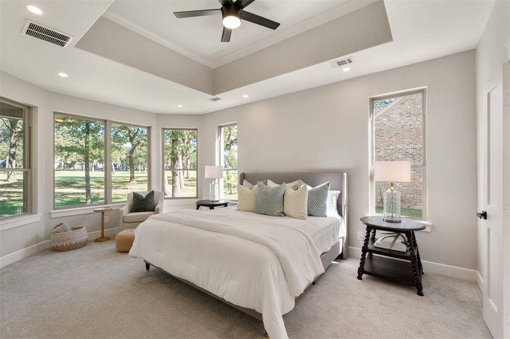 375 St. Andrews Drive, Mabank, TX 75156 Expansive en-suite sitting area and panoramic windows with serene views