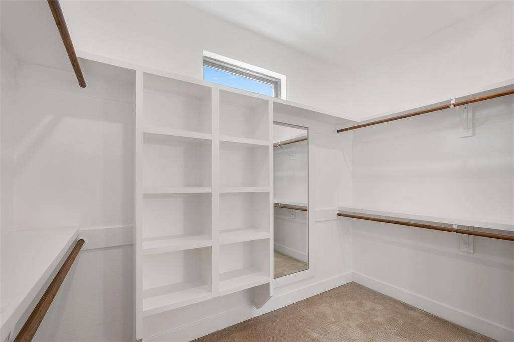 375 St. Andrews Drive, Mabank, TX 75156 Large walk-in closet featuring built-in organizers