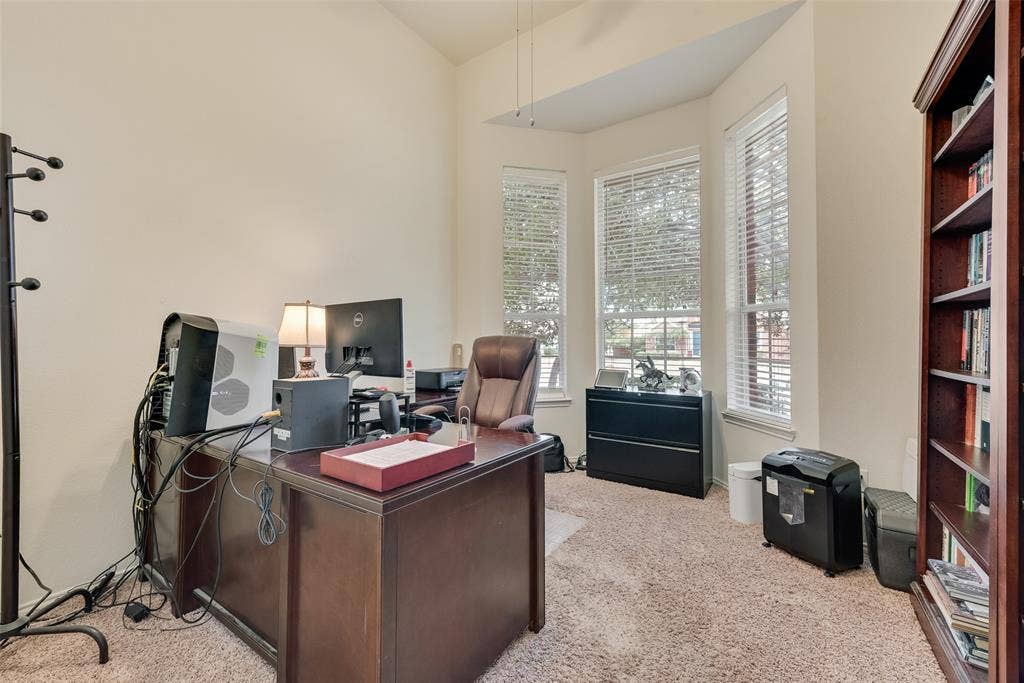 148 Oakbluff Drive, Murphy, TX 75094 Vaulted ceilings, bay window configuration, and carpeted flooring