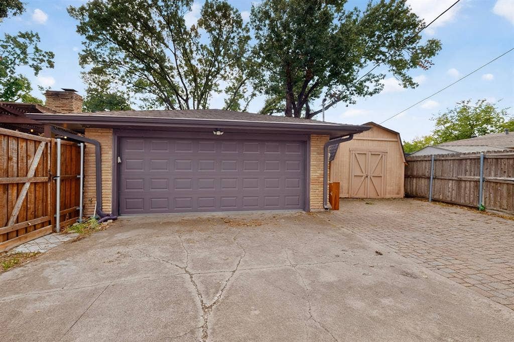 910 Sharpshire Street, Grand Prairie, TX 75050 Rear garage entry & shed