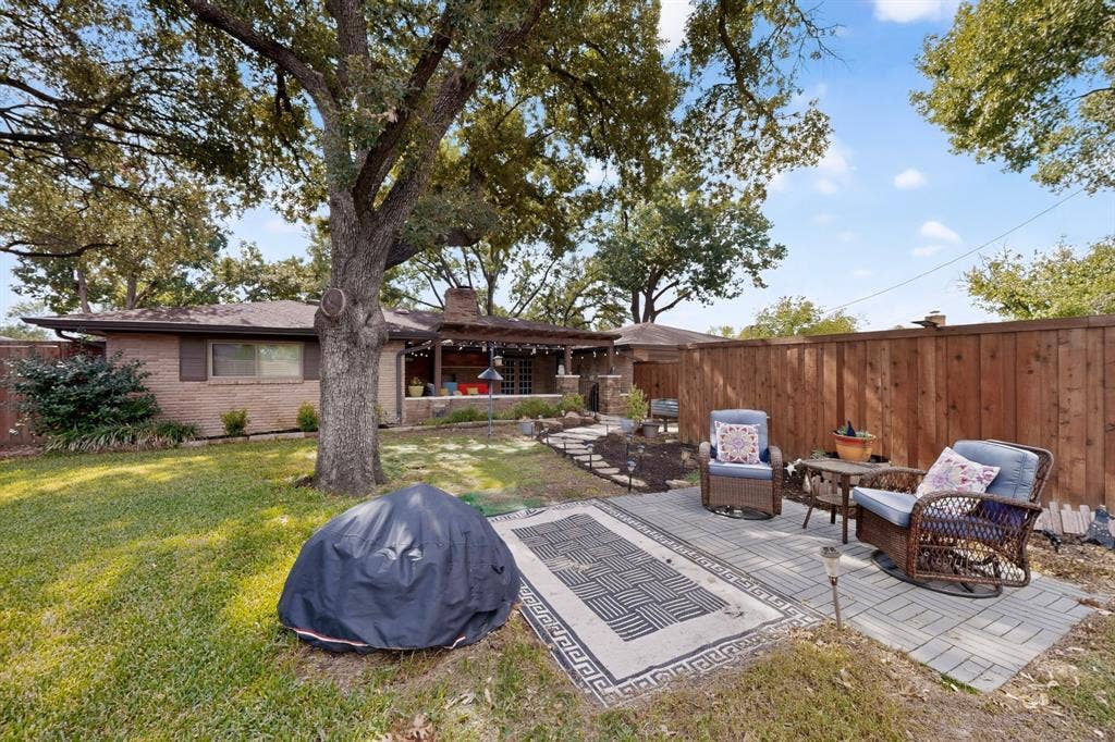 910 Sharpshire Street, Grand Prairie, TX 75050 Wonderful large backyard with plenty of shade