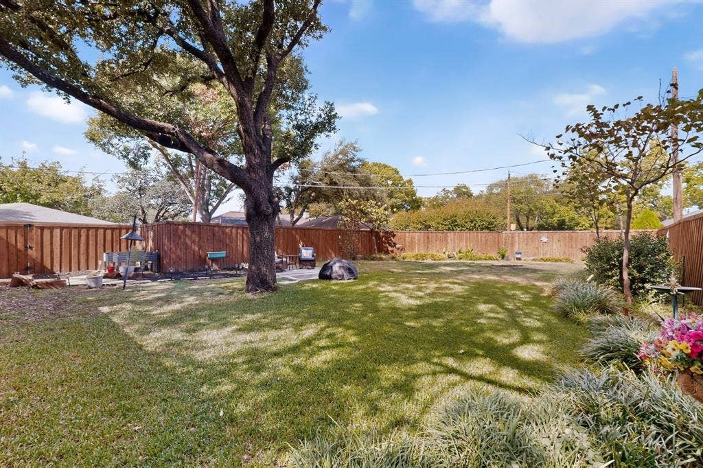 910 Sharpshire Street, Grand Prairie, TX 75050 Wonderful large backyard with plenty of shade