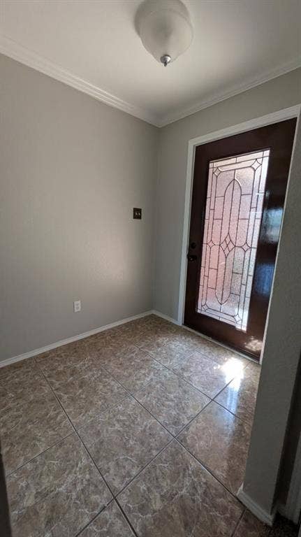 408 Oxford Loop Loop, Princeton, TX 75407 Entryway featuring large-format ceramic tile flooring, a dark-finish door with decorative glass inlay, and a flush-mount ceiling light fixture