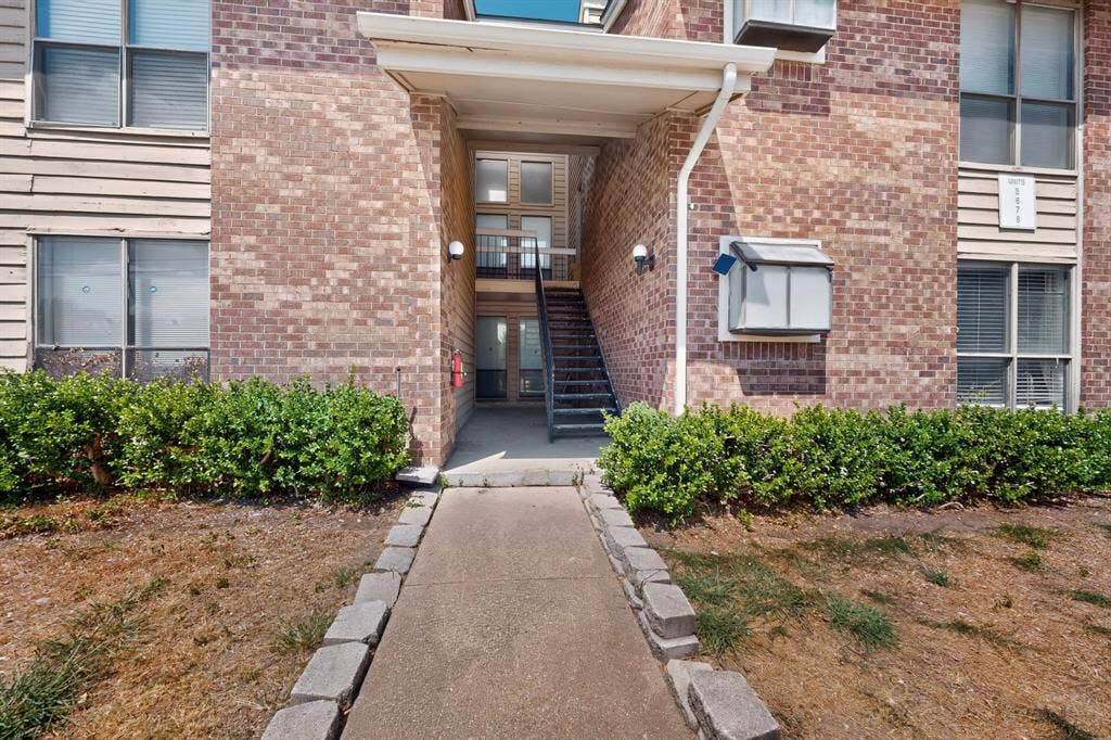 5750 Phoenix Drive, #6, Dallas, TX 75231 Brick exterior with horizontal siding accents