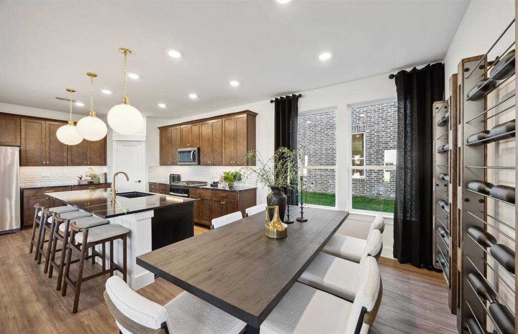 1308 Holmes Street, Celina, TX 75009 *Model Representation - Dining area off kitchen with large windows