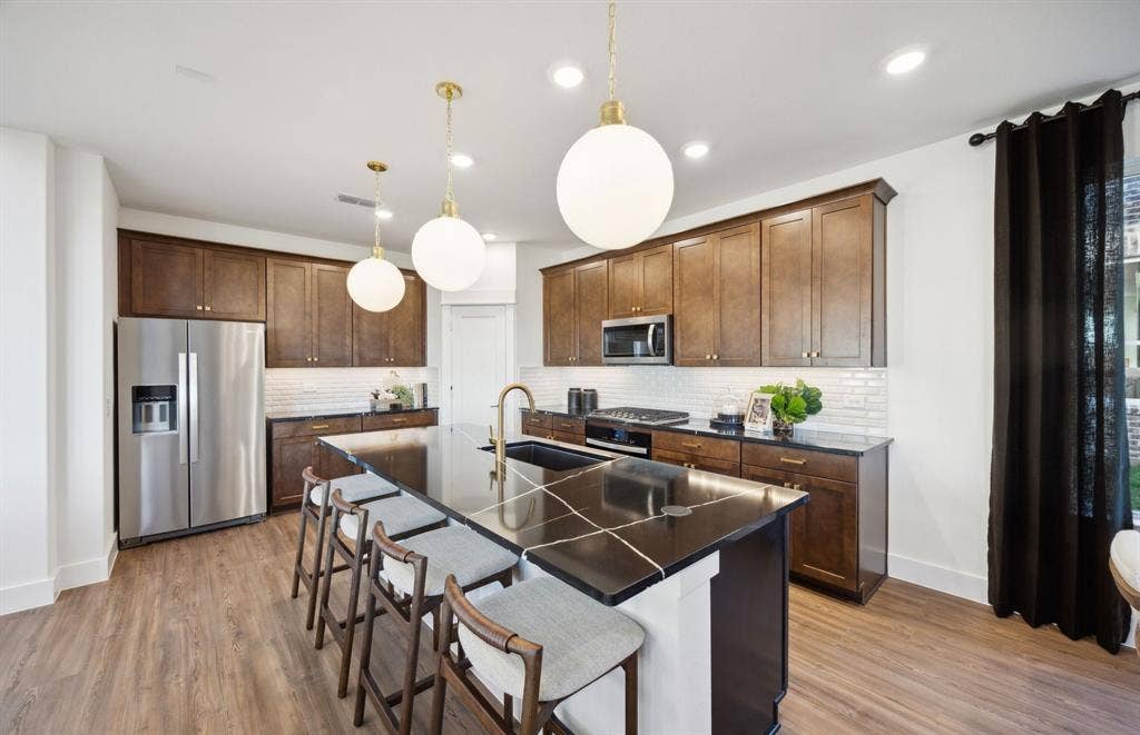 1308 Holmes Street, Celina, TX 75009 *Model Representation - Abundant cabinet space in kitchen