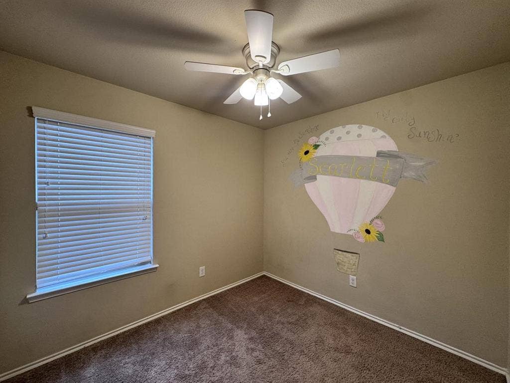 2105 Meadow Park Drive, Princeton, TX 75407 Interior space featuring neutral wall paint, carpeted flooring, a multi-blade ceiling fan with integrated light fixture, and horizontal window blinds