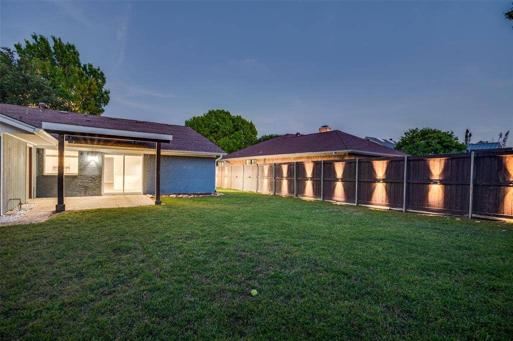 411 Fireside Drive, Richardson, TX 75081 Oversized Yard with Custom Lighting and Privacy Fence