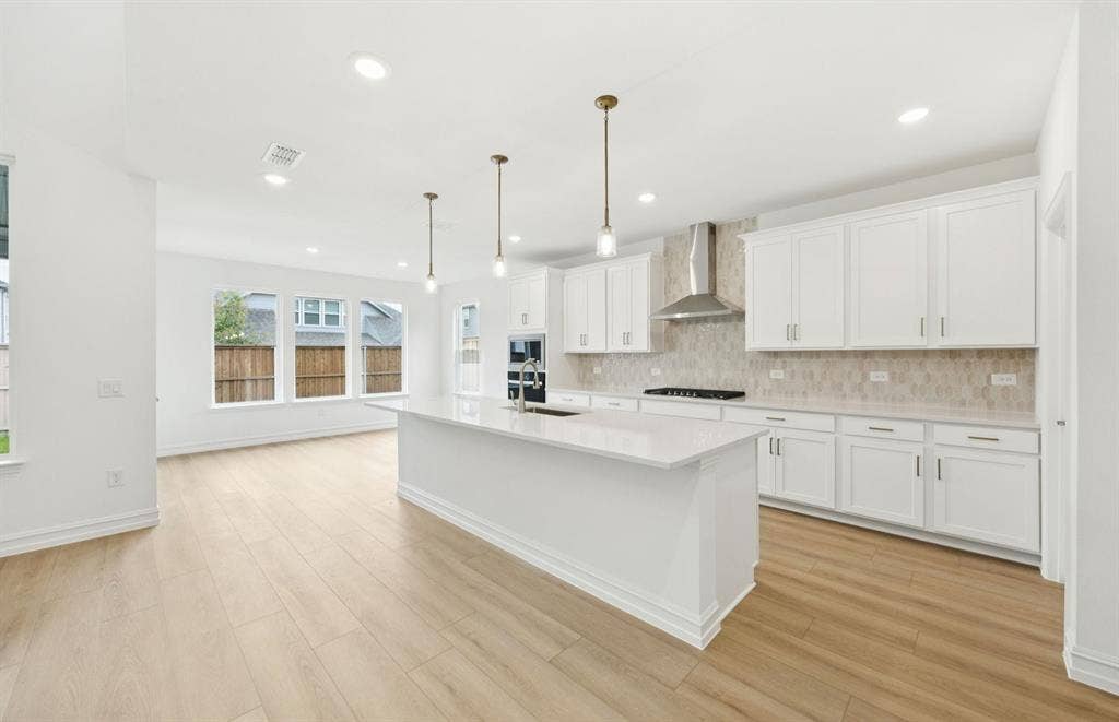 2700 Creekdale Drive, Celina, TX 75009 *Floorplan representation, not actual home - Spacious kitchen with eat-in bartop island