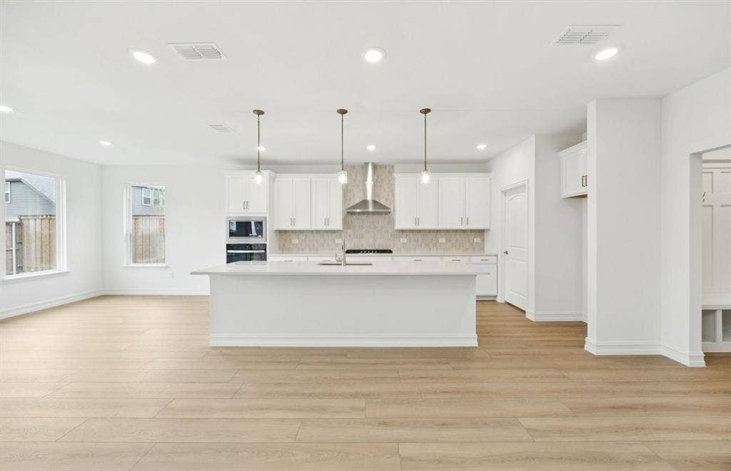 2700 Creekdale Drive, Celina, TX 75009 *Floorplan representation, not actual home - Large island gathering room and dining areas overlooking