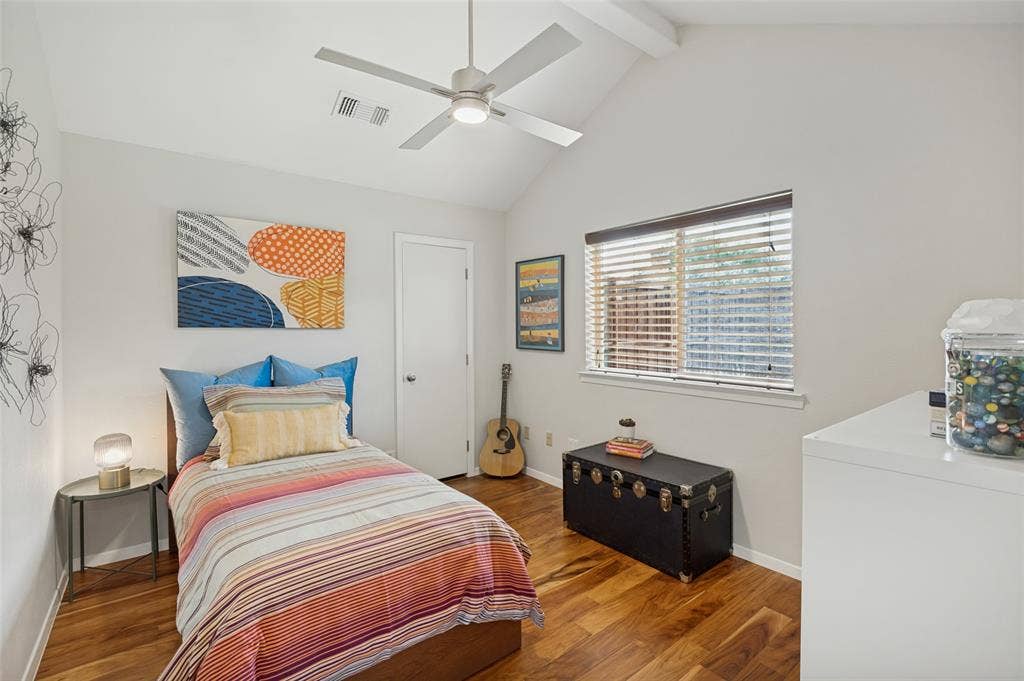 bedroom with vaulted ceiling