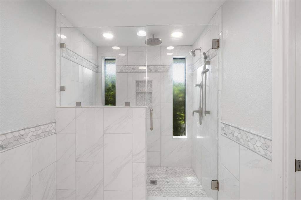2510 Buttercup Drive, Richardson, TX 75082 Stunning walk in shower with natural light.