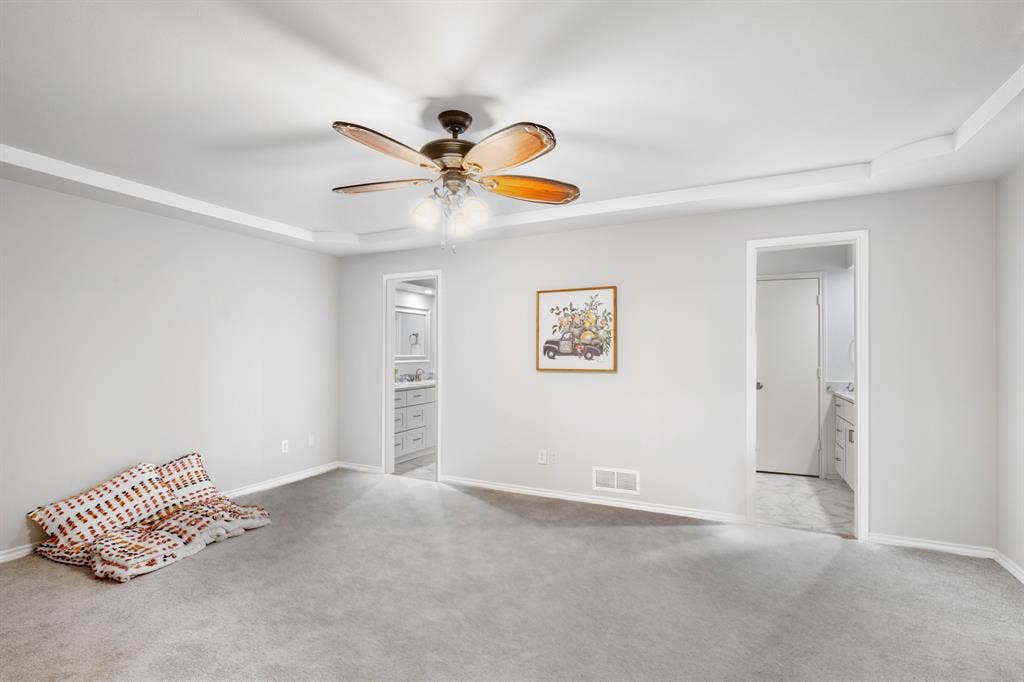 2510 Buttercup Drive, Richardson, TX 75082 Primary bedroom with his and her sides of primary bathroom.