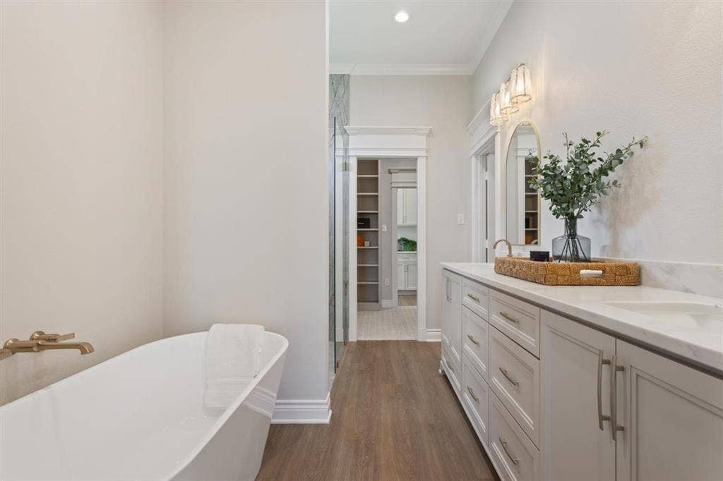 168 Water View Lane, Robinson, TX 76706 Site lines through bathroom through primary closet into laundry room
